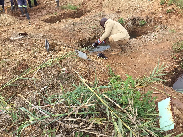 More misery for grieving families. . . As loved ones are buried in water-logged graves