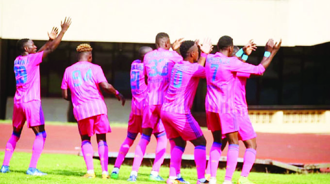 FOUR RED CARDS AS STUDENTS WIN