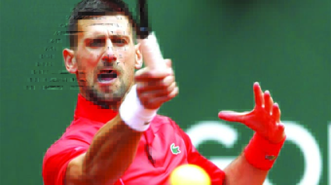 DJOKOVIC CELEBRATES 1 100TH WIN