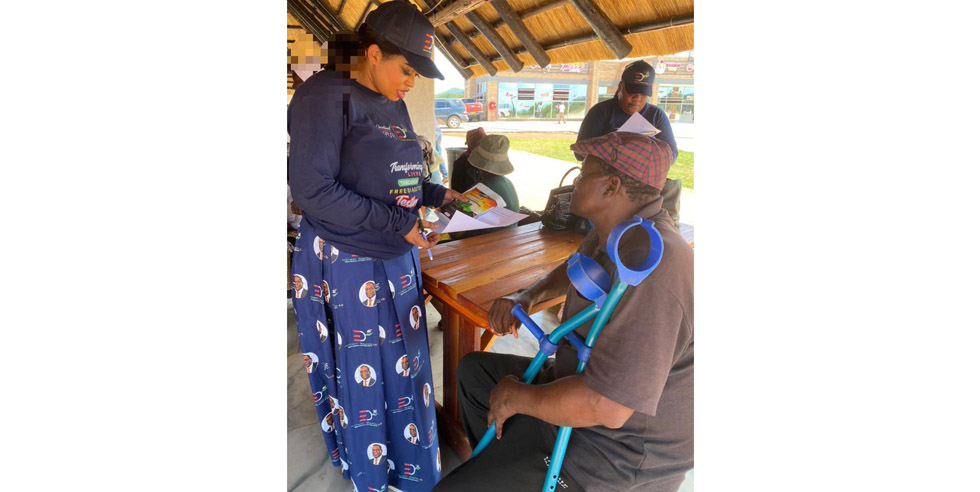 IPED chairlady, Ms Fely Mutsakani (left) attends to one of the patients in Buhera North last weekend