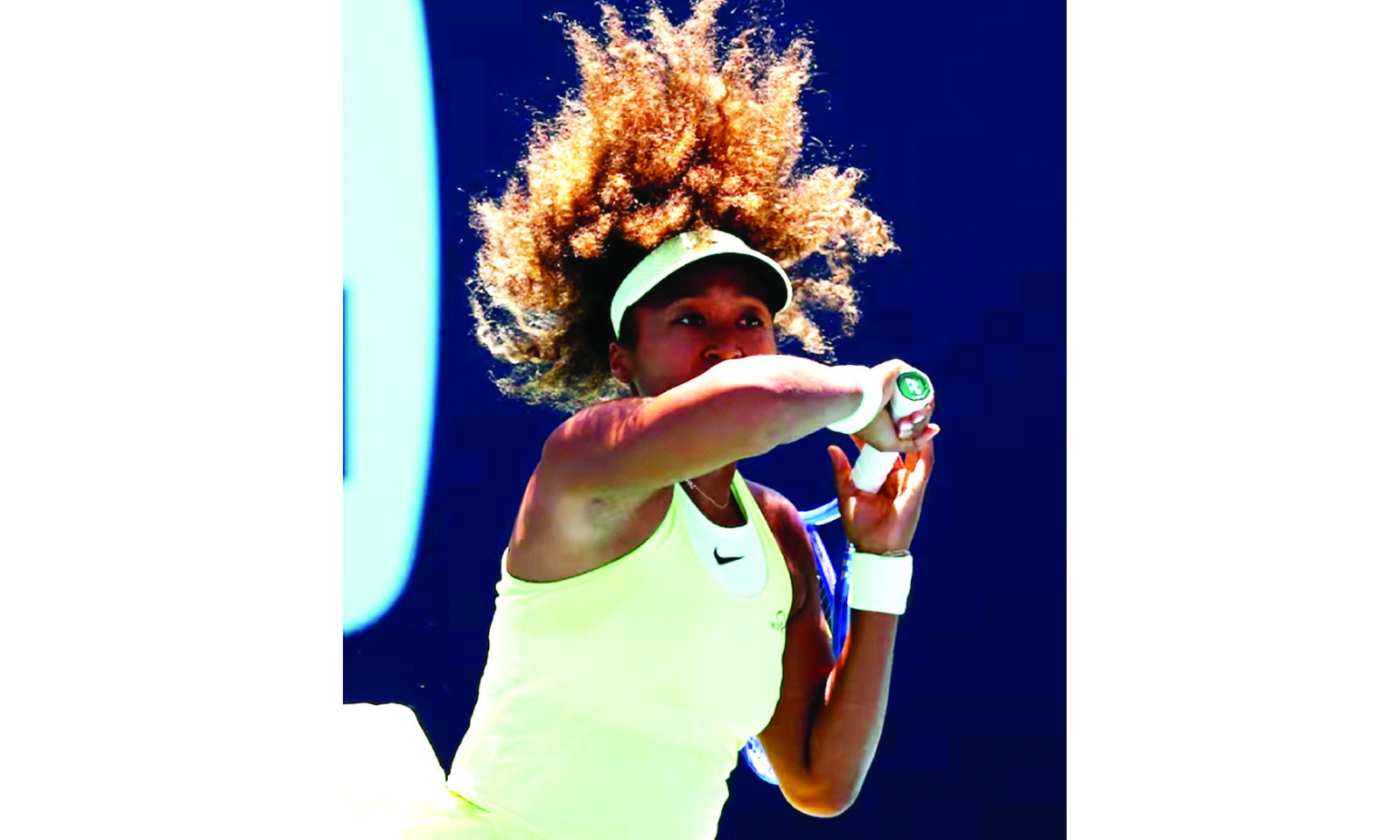 Osaka battles back to advance