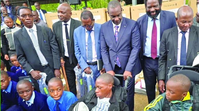 Children with disabilities receive assistive devices