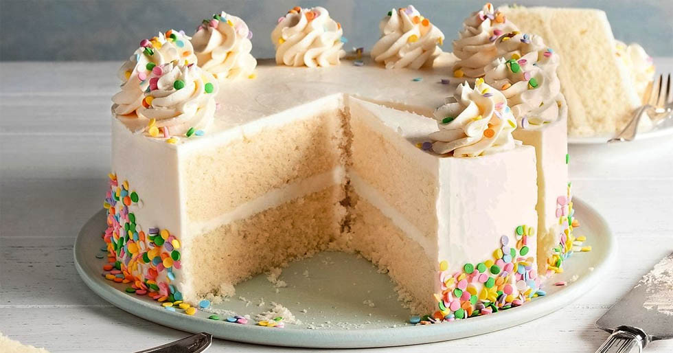 A delicious two layer vanilla cake with vanilla buttercream and strawberry