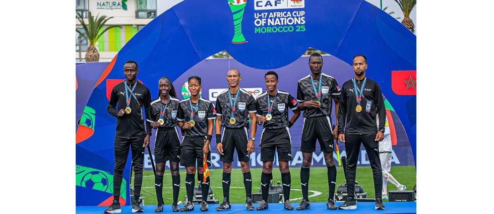 Brighton Chimene, in the middle, gets a Kodak moment with his colleagues at the end of the Africa Cup of Nations Under-20 finals last Sunday