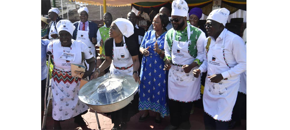 Tourism and Hospitality industry Minister Honourable Barbara Rwodzi (second from left) hands over a hamper to the first price winner of disabled persons Mrs Sherry Gonese while Minister of State for Manicaland Provincial Affairs and Devolution Advocate Misheck Mugadza (second from right) and other delegates follow proceedings during the Manicaland Provincial Cook-out Competition held at Mutare Teachers’ College last Friday. – Picture: Tinai Nyadzayo