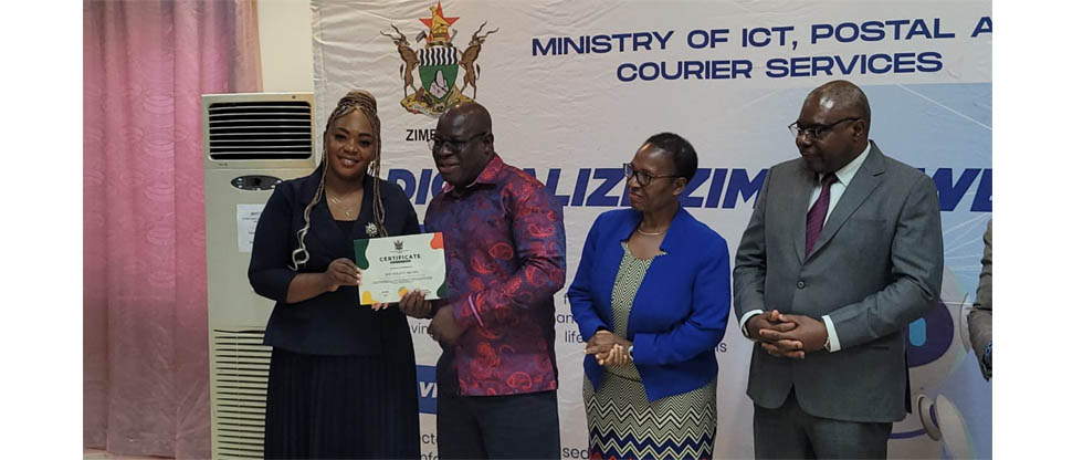 ICT, Postal and Courier Services Minister, Honourable Tatenda Mavetera (left) presents Honourable Brown Ndlovu with a certificate, while the Ministry’s Permanent Secretary, Mrs Babra Chirume and POTRAZ Deputy Director General Mr Alfred Marisa look on during the ITC Parliamentary Portfolio Committee workshop on Cyber Security, Cyber Crime and Data Protection for ICT held in Mutare yesterday. – Picture: Tinai Nyadzayo