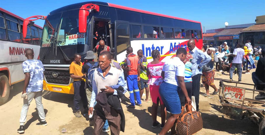 People go about their daily business at Musika Bus Terminus in Sakubva. - Picture: Tinai Nyadzayo