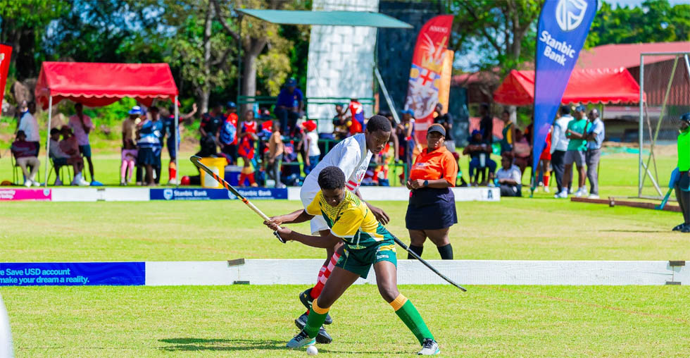 St George’s and Eaglesvale players tussle for the ball at the St George’s College Stanbic Hockey 5’s Tournament over the weekend