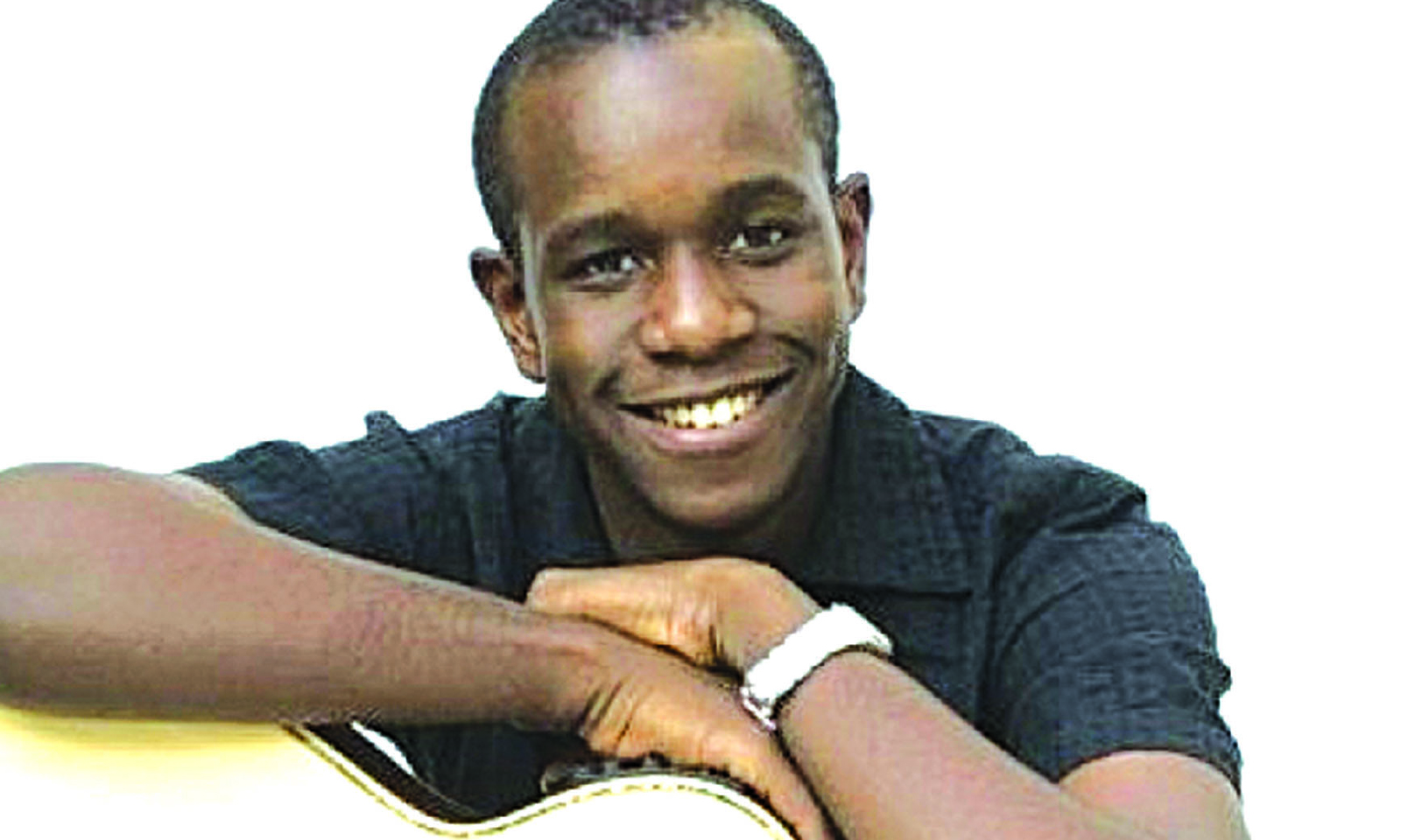 SAM MTUKUDZI UNDER THE SPOTLIGHT