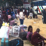 Learners prepare to board buses to their respective boarding schools at Meikles Park in Mutare on Monday. - Picture: Tinai Nyadzayo
