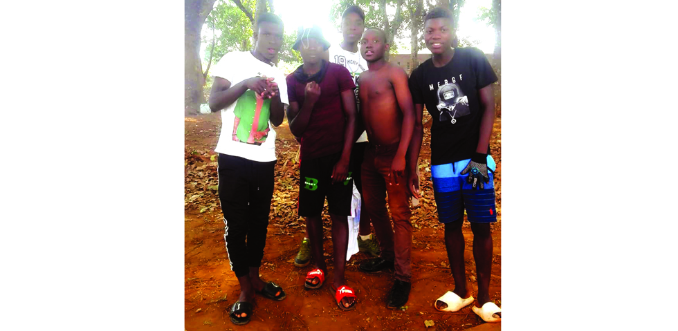 Leevas Jeranyama (shirtless) and friends during the drug abuse era