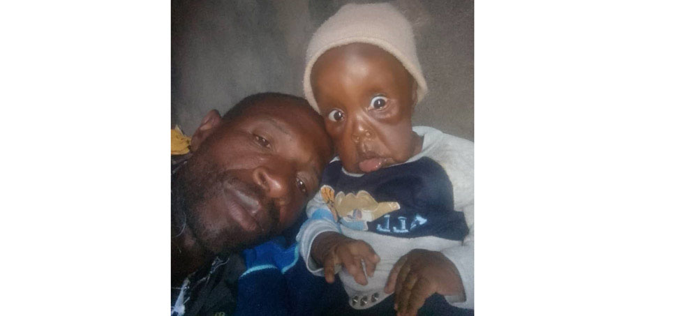 The late Japhet Junior with his father