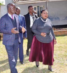 First Lady Dr Auxillia Mnangagwa being shown around Churchill School by headmaster Mr Aquanos Mazhunga on Friday