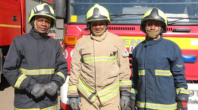 Heroes in boots, helmets. . . Men and women who put their lives on the line