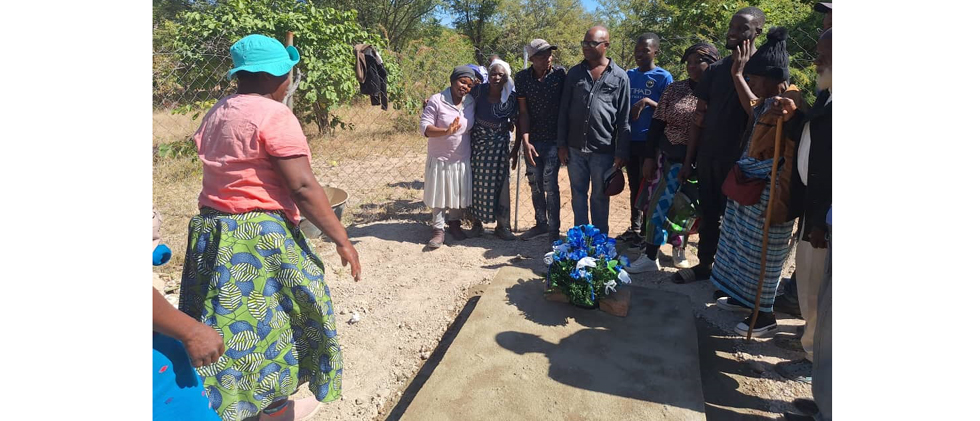 The late Alex Maonde's relatives at his grave in Buhera