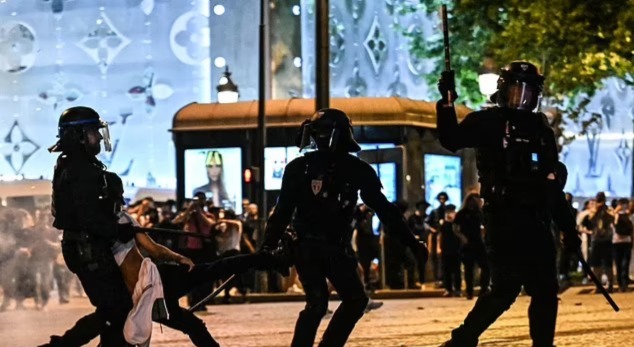PSG ‘barbarians’ tear Paris apart: 294 arrested and 205 people injured, with a 17-year-old killed, in Champions League celebrations… as city braces for more chaos at tonight’s parade