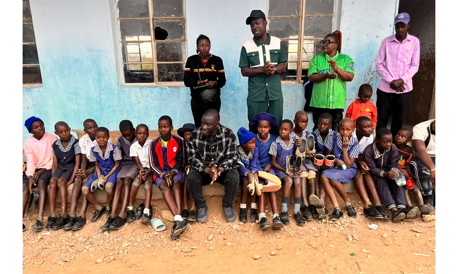 ZANU PF Youth chairTapiwa Masenda donates 150 pairs of shoes and pays school fees for learners in Hurungwe
