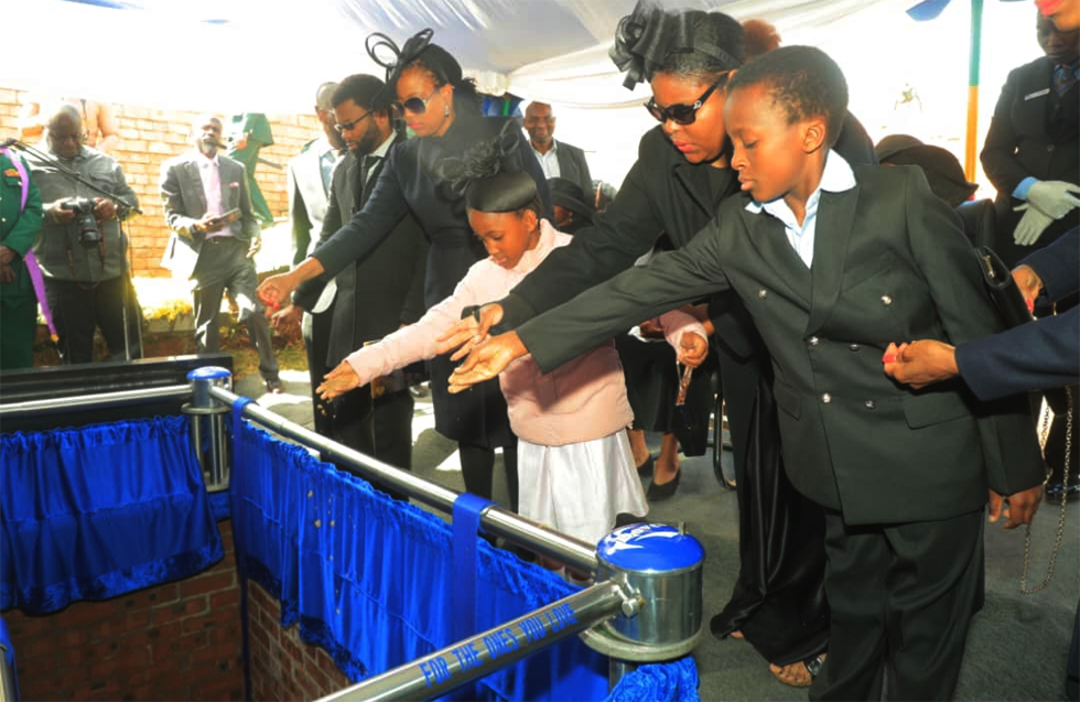 Family members pay their last respects to the late national hero Dr Gata