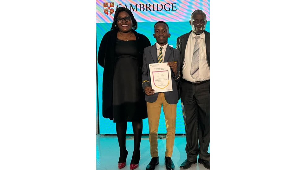 NUMERO UNO . . . Princeton Institute Form Six learner, Fungai Michael Nhanhanga gets a Kodak moment with his Mathematics teacher, Mrs Tambudzai Mujima and the institute’s principal, Mr Cyril Manhimanzi at the award presentation ceremony in the capital recently
