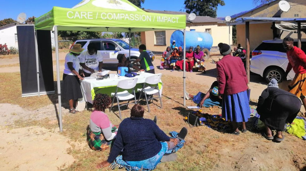 Mrs Alice Dube offers bereavement counselling to a Zimunya resident during one of Island Hospice and Healthcare’s mobile clinic outreach programmes
