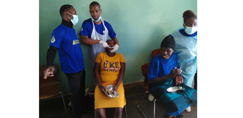 Members of the community from Nyanga receive free medical care from the visiting team