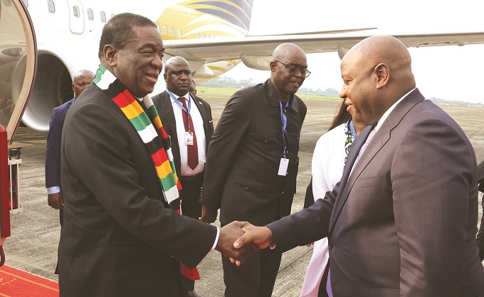 President Mnangagwa is welcomed by Equatorial Guinea Prime Minister Manuel Osa Nsue Nsua, at Santa Isabel Malabo International Airport, in Malabo, Equatorial Guinea, yesterday. President Mnangagwa joins other Heads of State and Government in Equatorial Guinea for the 7th AU Mid-Year Coordination Meeting. — Picture: Presidential Photographer Tawanda Mudimu