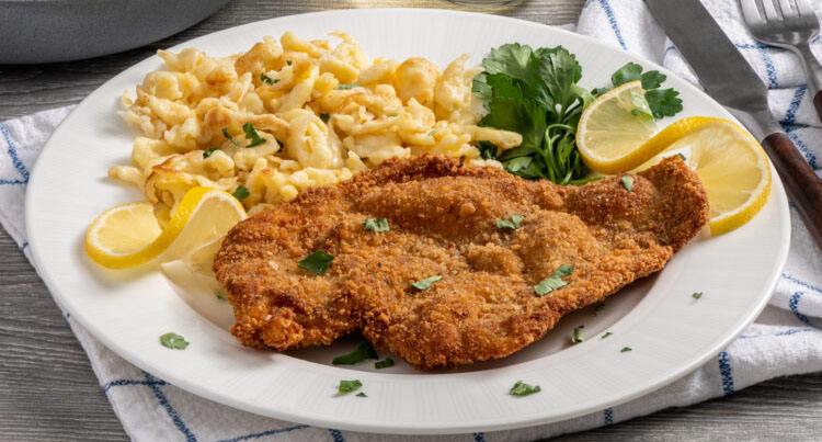 Schnitzel is usually either chicken, pork or veal that is pounded very thin