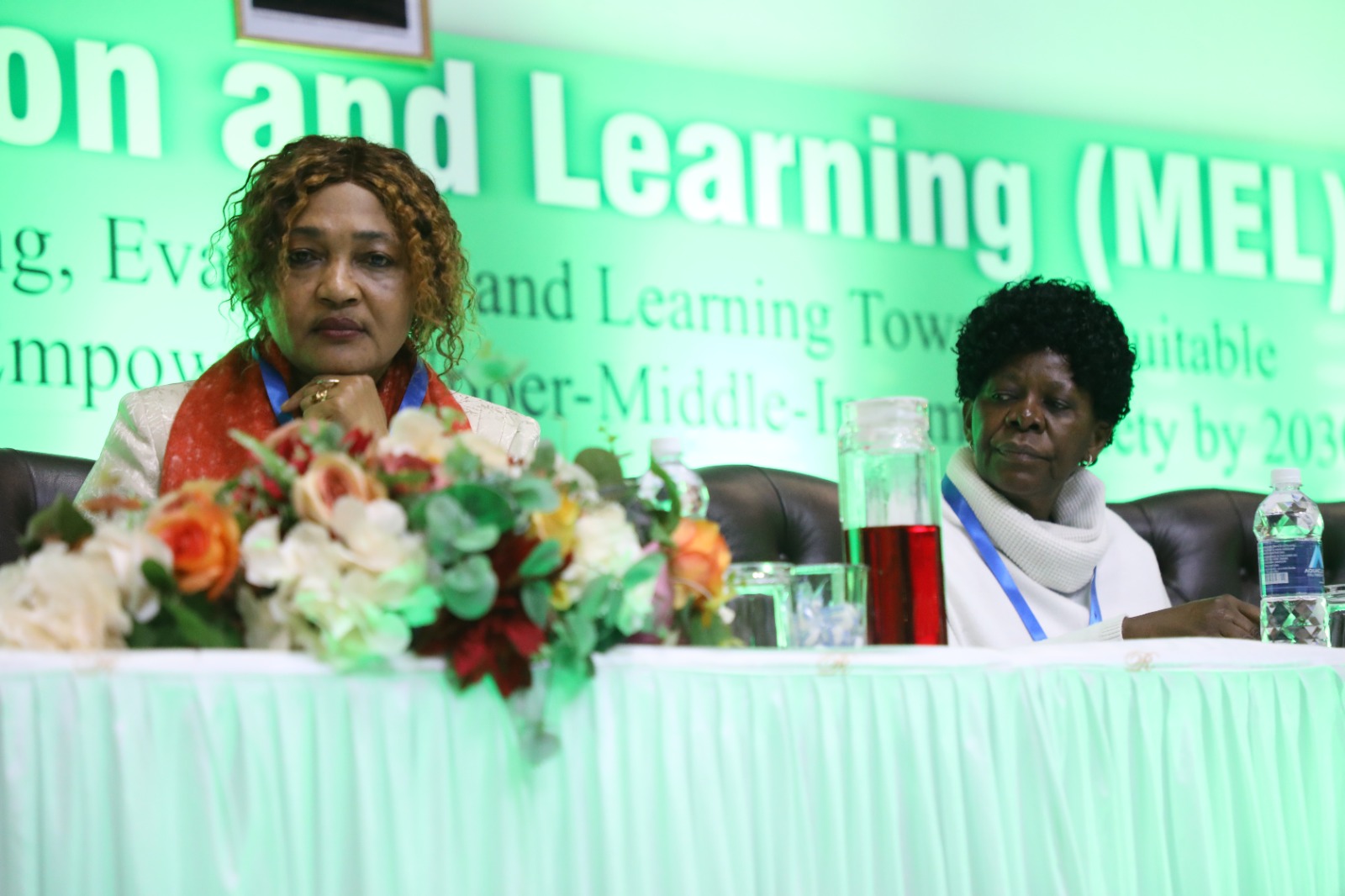 United Nations Population Fund (UNFPA) country representative for Zimbabwe Ms Miranda Tabifor (left) Permanent Secretary for Presidential Affairs and Monitoring Implementation of Government programmes, (right) Ms Fananai Madambi, follow proceedings during monitoring, evaluation and learning week in Harare today. picture Memory Mangombe