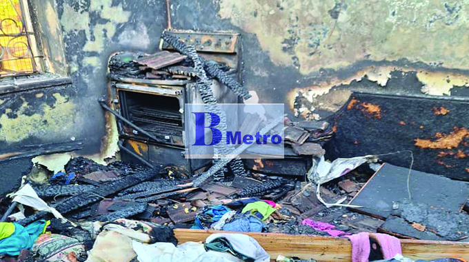 HOUSE BURNS DOWN IN NORTH END! Family watches in tears as fire guts home to ashes
