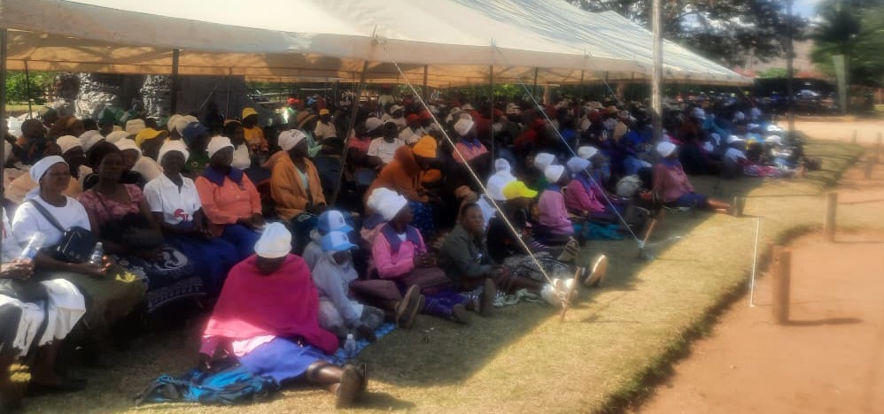 People attending Dr Sydney Gata's memoria service at his farm this afternoon
