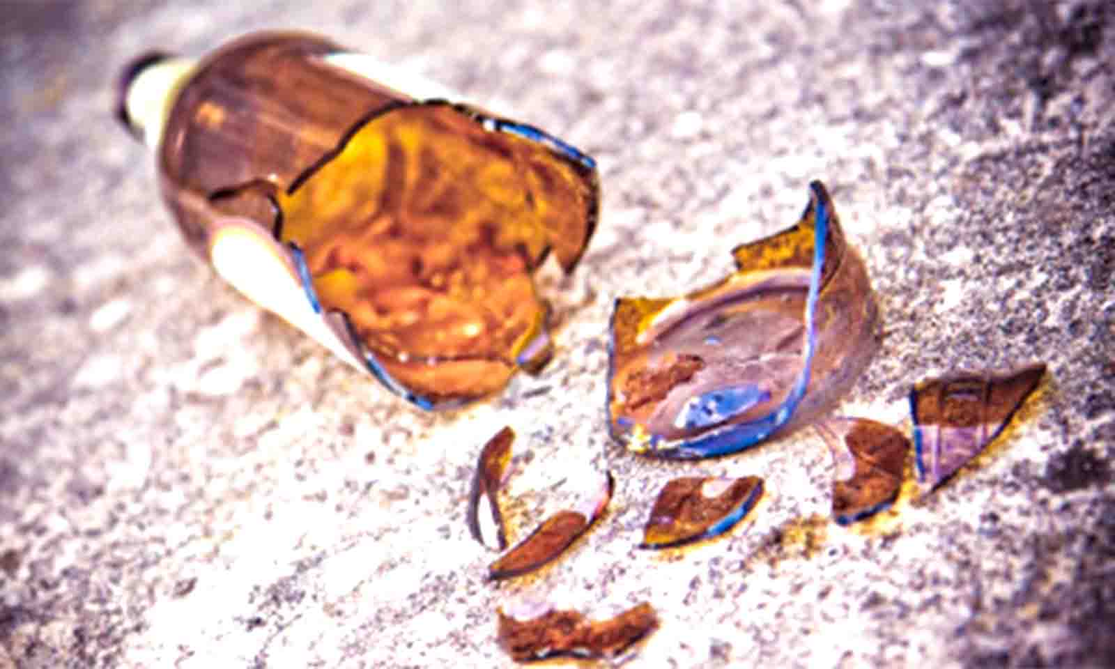 WOMAN BASHED TO DEATH IN ROW OVER BEER