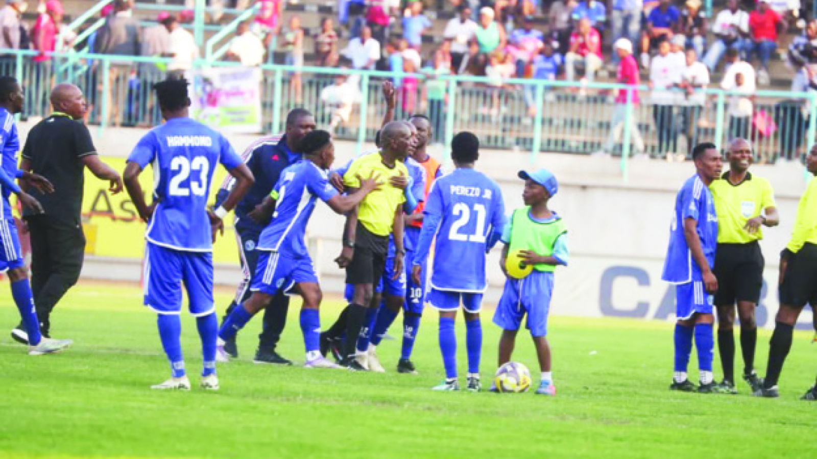 REF UNDER SPOTLIGHT . . . DeMbare, Triangle share spoils