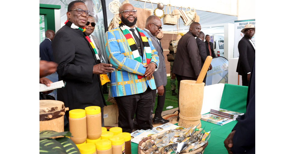 President Mnangagwa, Vice President Chiwenga(partly obscured) and Minister of State for Manicaland Provincial Affairs and Devolution, Advocate Misheck Mugadza tour the Chipinge Rural District Council exhibition stand at Mutare Sports Club, before the official opening of the Sanganai/Hlanganani/Kumbanayi World Tourism Expo on Wednesday. — Picture: Tinai Nyadzayo