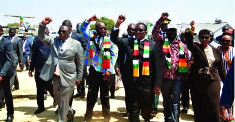 President Mnangagwa (centre), Vice President Chiwenga (left), ZANU PF National Chairman, Cde Oppah Muchinguri-Kashiri (far right), Minister of State for Manicaland Provincial Affairs Devolution, Advocate Misheck Mugadza and other officials being welcomed by the ruling party supporters at Grand Reef Aerodrome on arrival for the official opening of the Expo