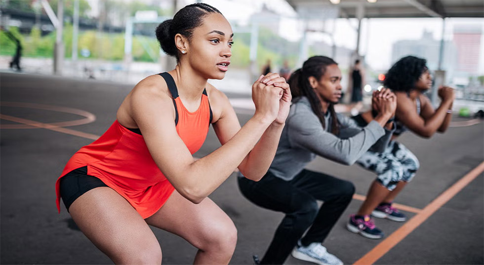 Performing a squat without learning the proper form can cause injury