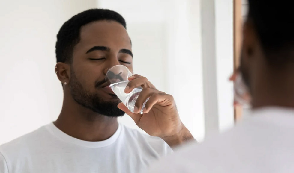 Staying hydrated helps maintain skin elasticity and can reduce dryness and flakiness