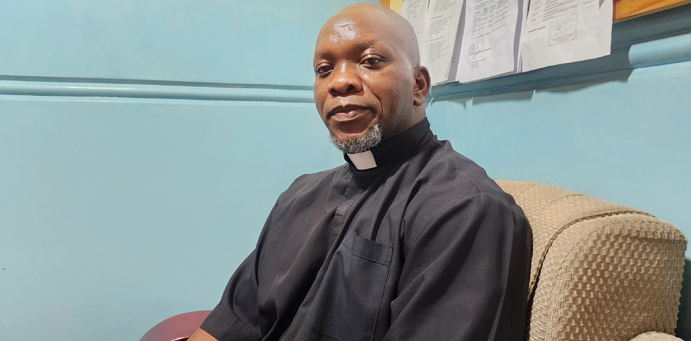 The school chaplain and administrator, Reverend Father Johannes Rateiwa