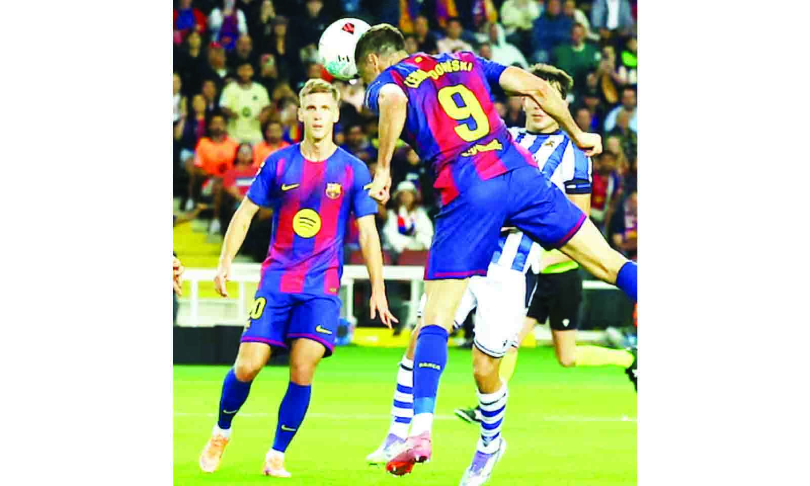 Barcelona go top of La Liga