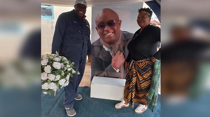 The final bow. . . Family, friends & colleagues pay final respects to cultural icon