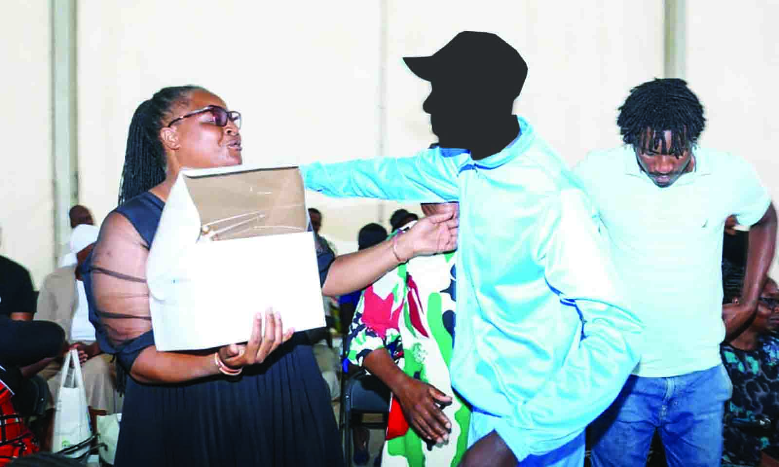 A mother embraces her son, a drug and substance abuse patient whose birthday coincided with the family visit and consultation day and brought him a birthday cake at Angel of Hope Drug Rehabilitation Centre in Mbare