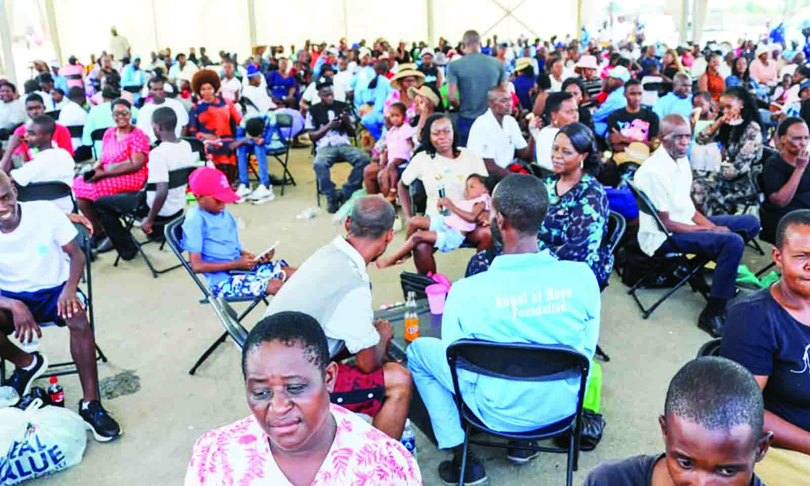 Family members and drug survivors interact and enjoy meals during a family visit and consultation day at Angel of Hope Foundation Drug Rehabilitation Centre in Mbare on Sunday