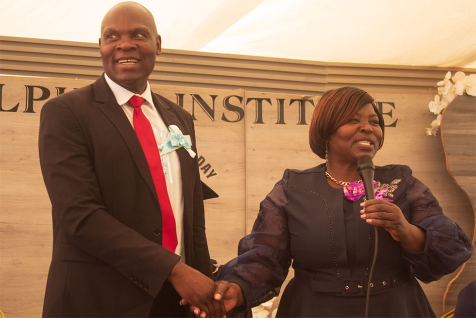 Alpha High School principal director, Mr Nangisai Marange (left) shares a lighter moment with Mutare District Schools Inspector, Mrs Tracey Mademutsa 
