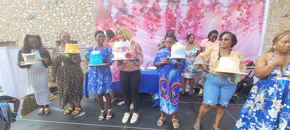  Some of the ladies display cakes that were being exhibted during the Ladies Summer Splash