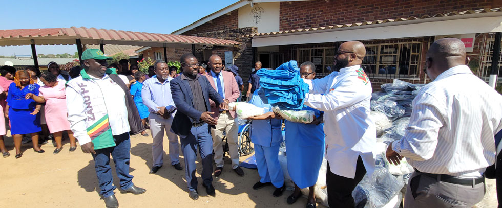 Minister of State for Manicaland Provincial Affairs and Devolution, Advocate Misheck Mugadza (second from rights) hands-over blankets donated to St Joseph’s Mission Hospital by the patron of the Angel of Hope Foundation as well as Health Ambassador, Dr Auxillia Mnangagwa to the hospital superintendent, Dr Tapiwa Musiyambiri on Wednesday