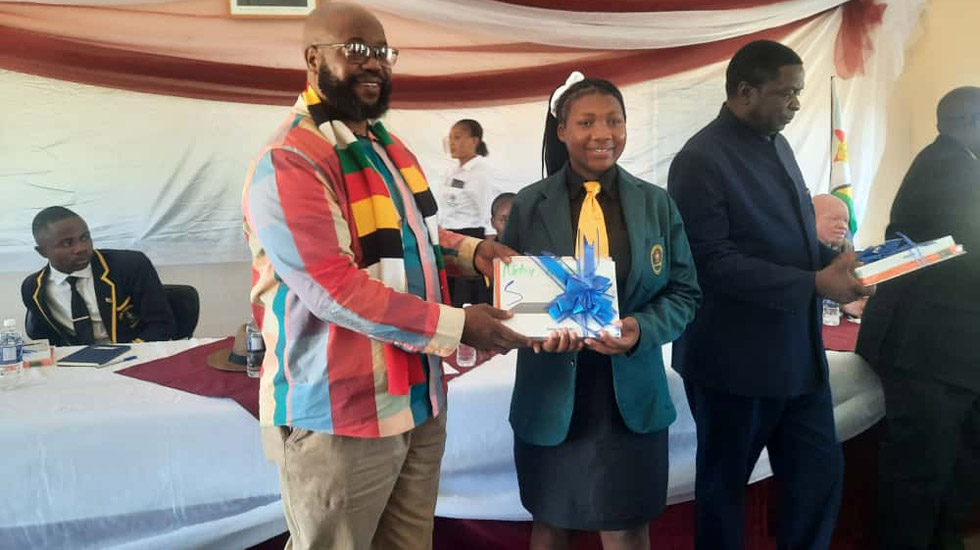 President Mnangagwa gifts junior parliamentarians with tablets