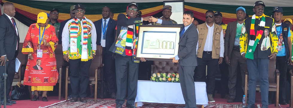 President Mnangagwa receives a token of appreciation after commissioning the Mega Market Four Milling Plant from the company’s managing director, Mr Shiraan Ahmed last Saturday
