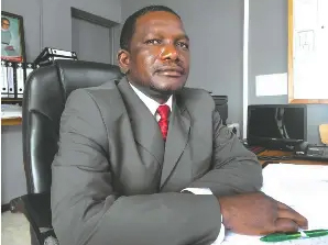 St Faith’s head, Mr Arnold Makamba