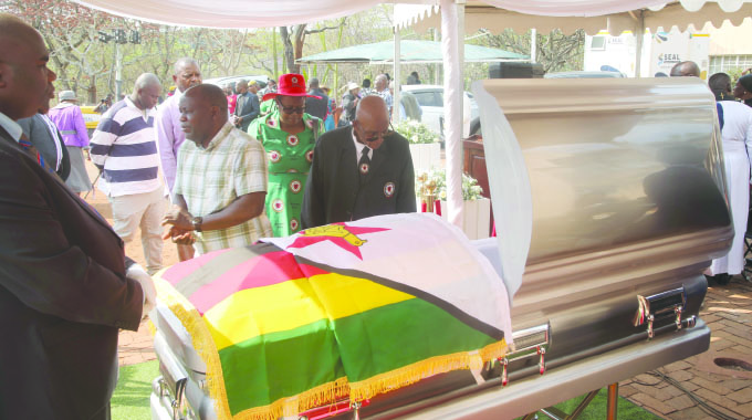 Friends and relatives pay their last respects to the late national hero Brigadier-General (Retired) Mpandasekwa Mzheri at a church service held at the family home in Helensvale, Harare yesterday. — Picture: Joseph Manditswara