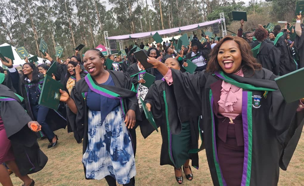 Some of the graduands celebrate during the ceremony