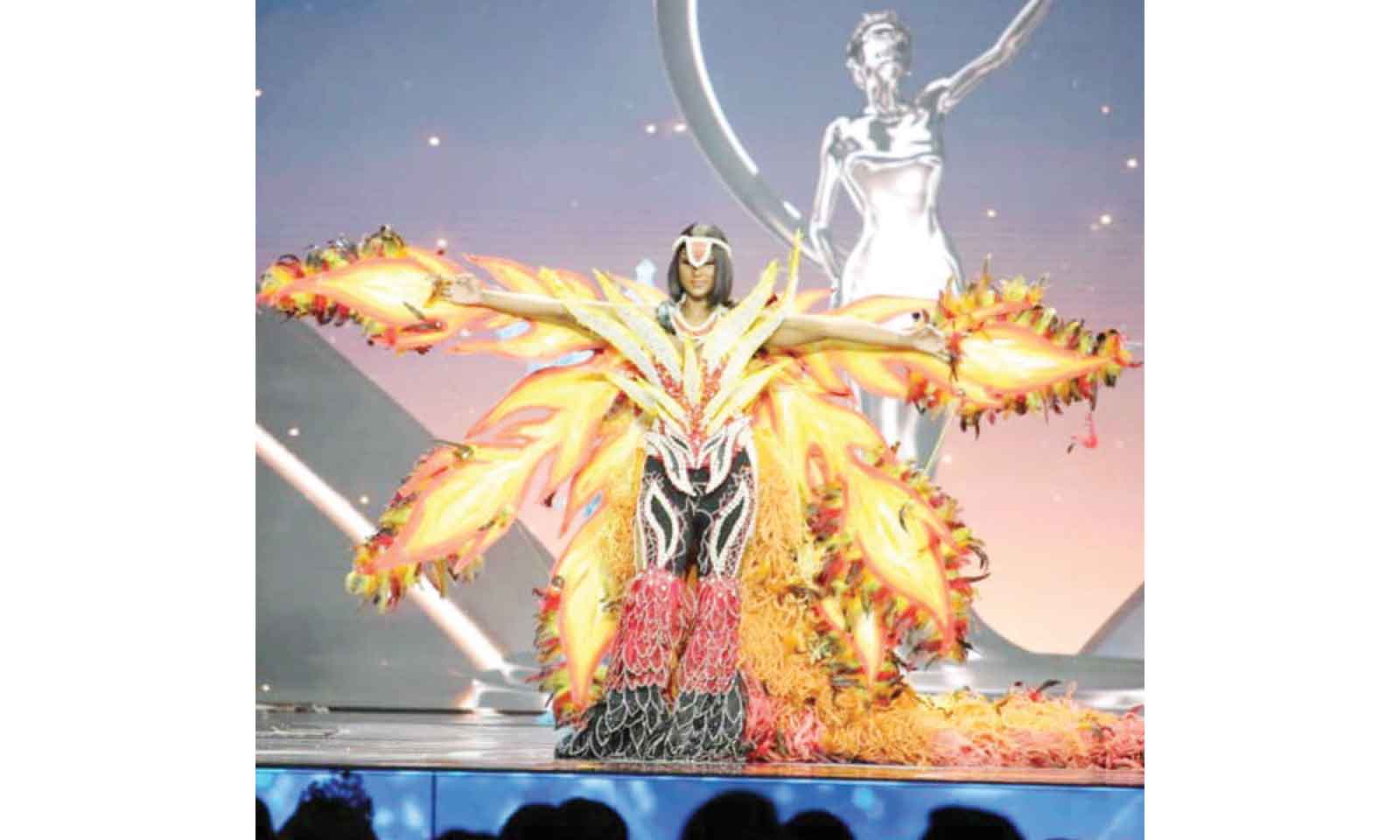 LYSHANDA DUBBED A ‘WALKING INFERNO OF GRACE’ AFTER HER COSTUME SETS BANGKOK ALIGHT